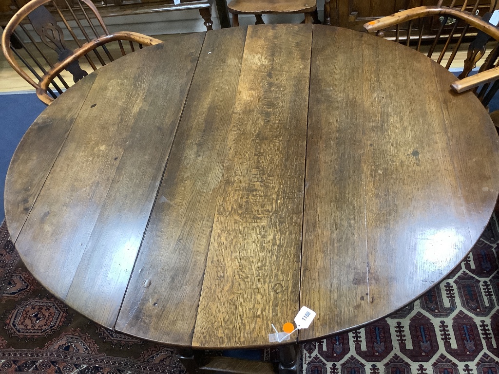 A late 17th century oak oval topped gateleg table